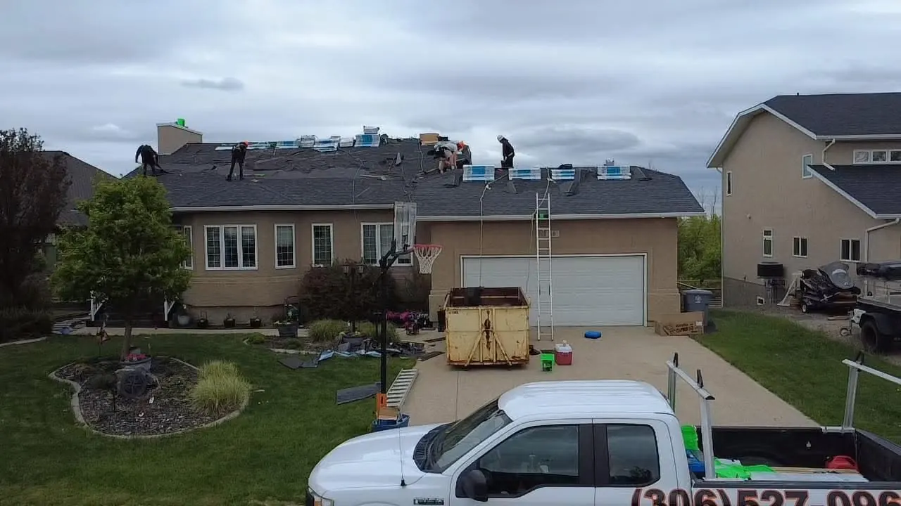 Roof tear-off in progress by Makan Roofing crew in Regina Saskatchewan